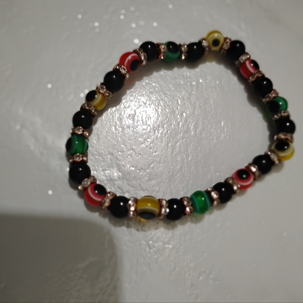 Multicolor Beaded  Stretchable Bracelet Cat Eyes Of Different Designs